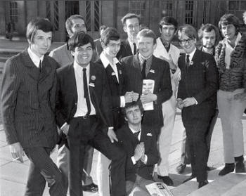 From another  angle (L-R) Pete Drummond, Tony Blackburn, Mike Raven,  Dave Cash, Duncan Johnson, Chris Denning, Ed Stewart,  Mike Ahern, John Peel, Emperor Rosko with Kenny Everett praying.
