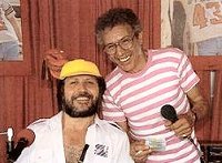 1983 - Dave Lee Travis with the late Alexis Korner.